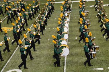 FARGO NORTH DKOTA, November 17, 2018: The North Dakota State University All Star marching band performs inside the FargoDome during halftime of the NDSU Bison football games. clipart
