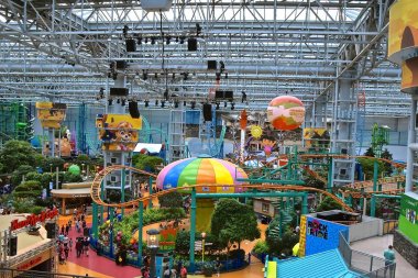 BLOOMINGTON MINNESOTA, May 24, 2019: A view of Nickelodeon Universe found in the Mall of America  (opening in 1992)in Bloomington owned by the Ghermezian Brothers  clipart