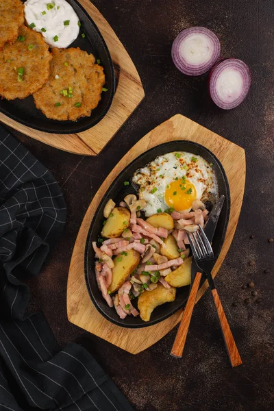 Backed potatoes with ham and egg