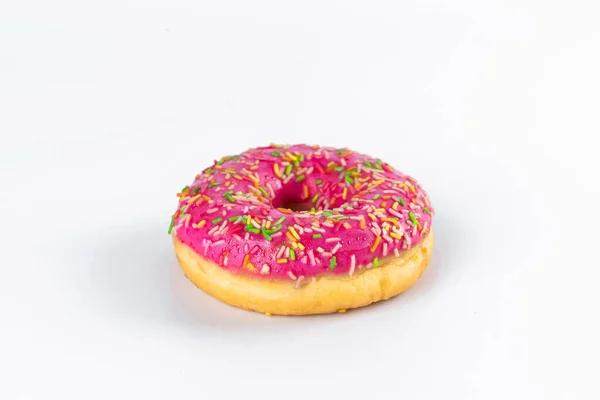Donut Mit Rosa Glasur Auf Weißem Hintergrund — Stockfoto