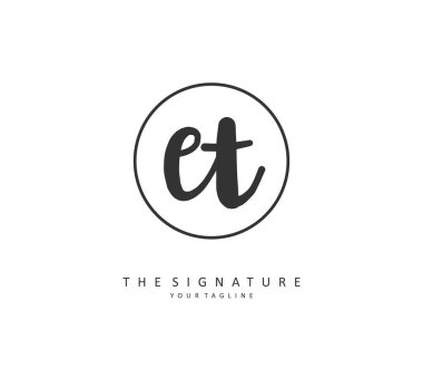 E T ET Initial letter handwriting and signature logo. A concept handwriting initial logo with template element.