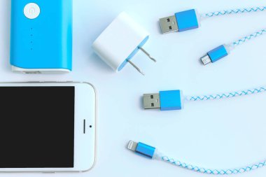 Usb kabloları üstten görünüm smartphone ve pil bankada ile şarj