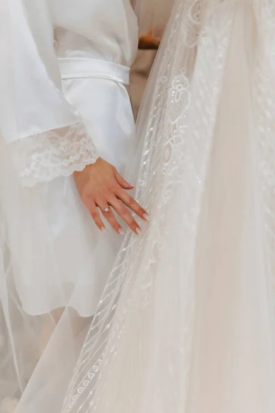 engagement ring with a stone on the gentle bride's hand