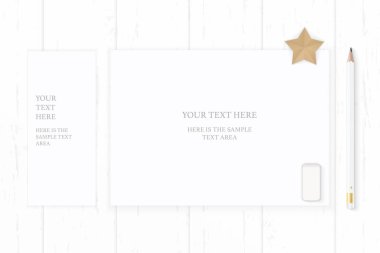 Düz yatıyordu üstten görünüm zarif beyaz kompozisyon kağıt kalem silgi ve yıldız şekli tekne ahşap arka plan üzerinde.