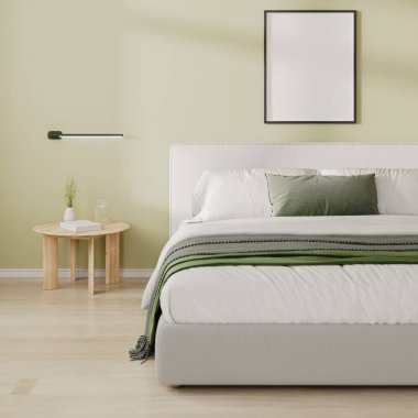 Boş Çerçeve yatak odasının iç kısmında yatağın üstünde maket yapıyor.