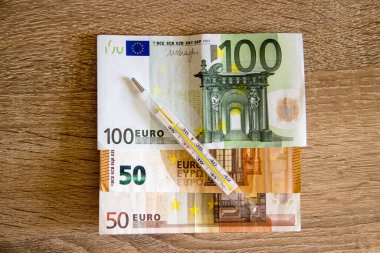 Termometre avro para biriminde yatıyor. Euro para birimi hastalık ve ekonomik kriz altında.