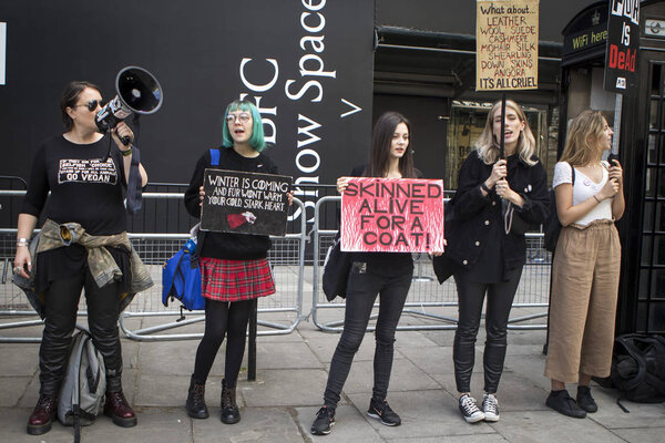 LONDON, ENGLAND - September 15, 2018, Anti fur protest during the London Fashion Week. People with placards