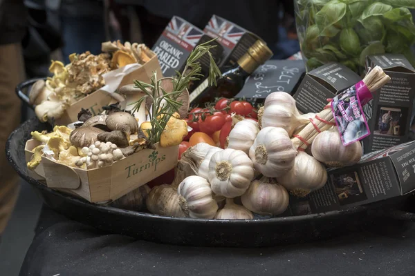 A set of mushrooms in birch bark boxes at Borough Market