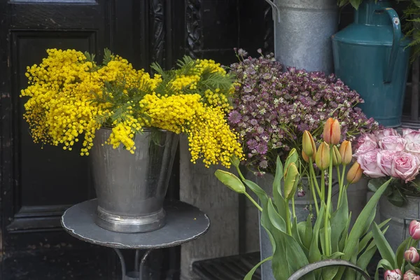 Bouquets of mimosa for sale at Liberty store in London — Stock Photo, Image