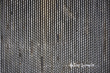 Metal şebekenin yapısı eski bir bataryadan. Desen.