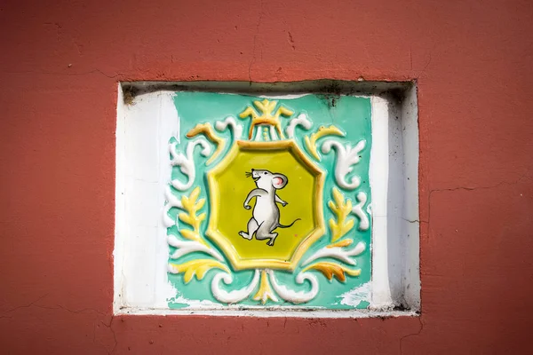 Myshkin, Russia - 26 July 2020 Myshkin Chamber, A small museum dedicated to mice. There are mice from cartoons, mice dolls, mice toys. Tile swatches. Glazed mouse - decoration of facades of houses