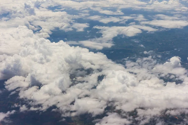 Blue sky with clouds on the airplan — Stock Photo, Image