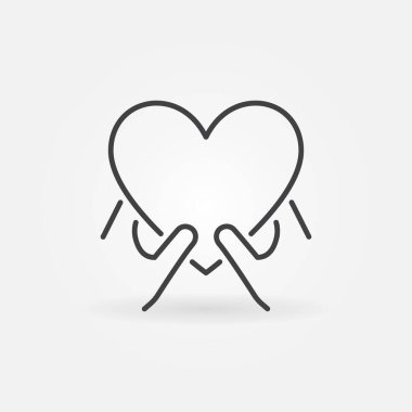 Kalp hatları simgesi olan eller. Charity doğrusal sembolü