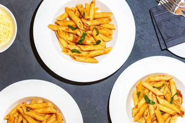 Three Plates Penne Alla Vodka Direct Hard Flash Light Top — Stock Photo, Image