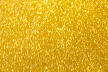 Tatil ve herhangi bir proje için bulanık glitter altın arka plan. Sığ derinlik-in tarla. Yatay