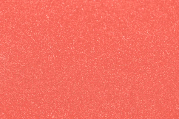 Sparkling festive pink holiday background. Celebration concept. Top view, flat lay, horizontal. Living coral theme - color of the year 2019