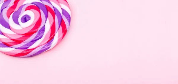 Big Lollipop Solid Pink Background Horizontal Banner Format — Stock Photo, Image