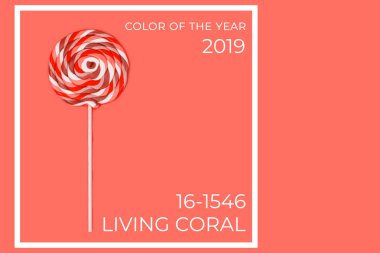 Büyük lolipop düz pembe arka plan üzerinde. Yatay. Yaşam mercan Tema - 2019 yılın renk