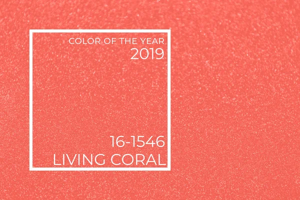 Sparkling festive pink holiday background. Celebration concept. Top view, flat lay, horizontal. Living coral theme - color of the year 2019