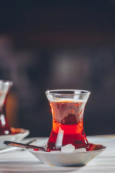 Turkish tea in the restaurant. Turkish cuisine and travel  concept. Vertical