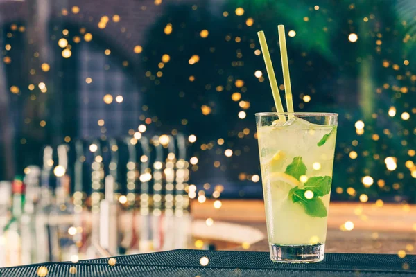 Lemonade at the bar stand. Luxury vacation concept. Festive holiday celebration bokeh