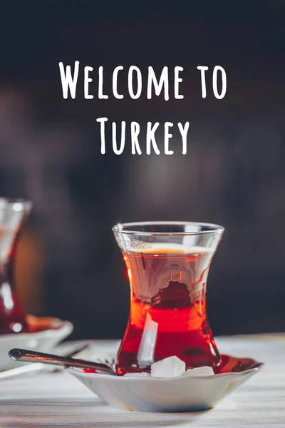 Turkish tea in the restaurant. Turkish cuisine and travel concept. Welcome to Turkey wording