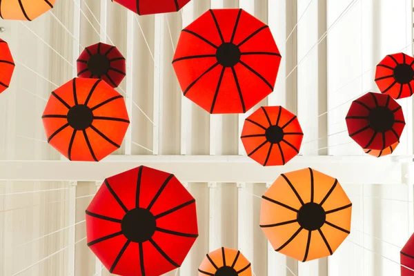 Background with decorative umbrellas on the white drop — Stock Photo, Image