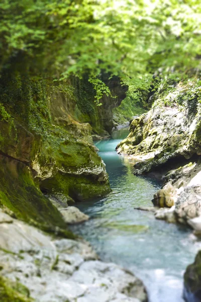 tilt shift landscape blue river mountains cliffs greenery wemna summer  blurred