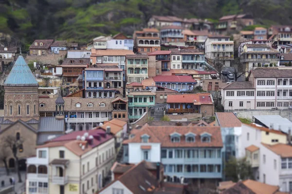 tilt shift landscape city roof with multicolored heights window