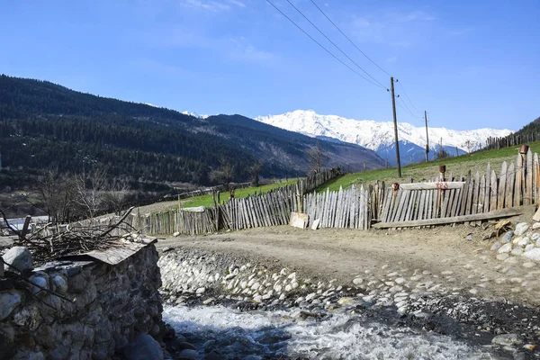 village in the mountains old broken fence panorama high roa