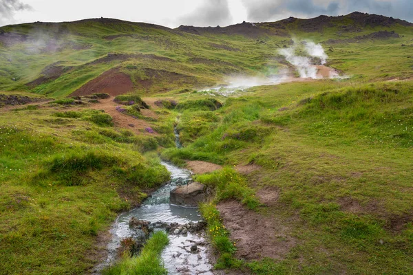 Hengilssvaedid hot springs hiking trail near Reykjavik in the Golden Circle of Iceland.  The climb features panoramic views and natural hot springs