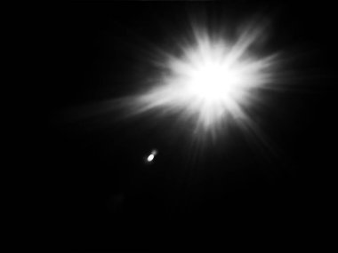 Gerçek güneş patlaması için siyah arka plan üzerinde fotoğraf tasarım üzerinde yatıyordu