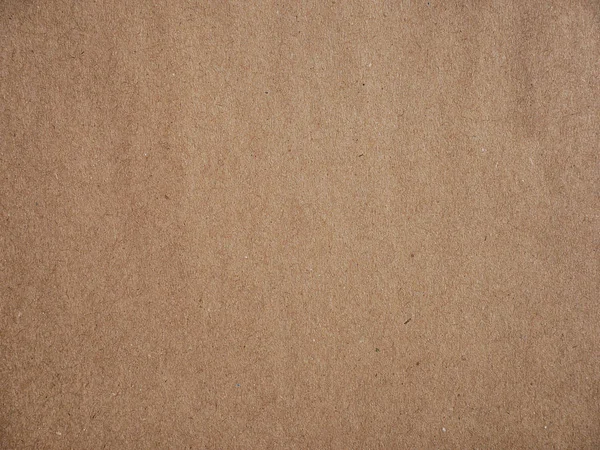 Cartón artesanal marrón viejo áspero fondo de cartón liso — Foto de Stock