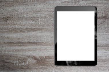 kopya alanı için arka plan ile dijital tablet ahşap masa