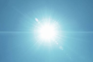Güneş ışığı hareket Lens flare açık gerçek mavi gökyüzü arka plan