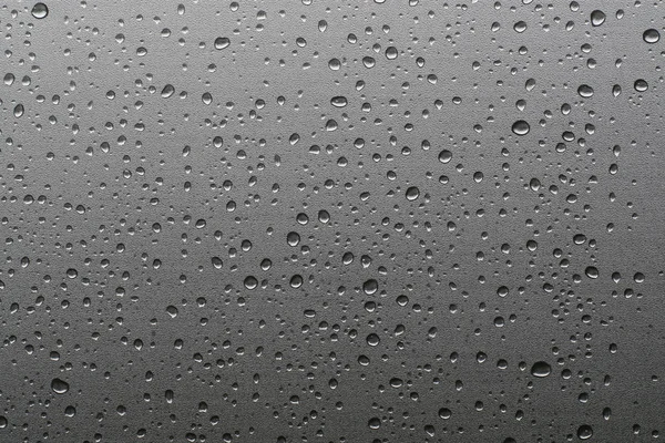 Regndroppar på fönster glas naturligt mönster av regndroppar bakgrund — Stockfoto