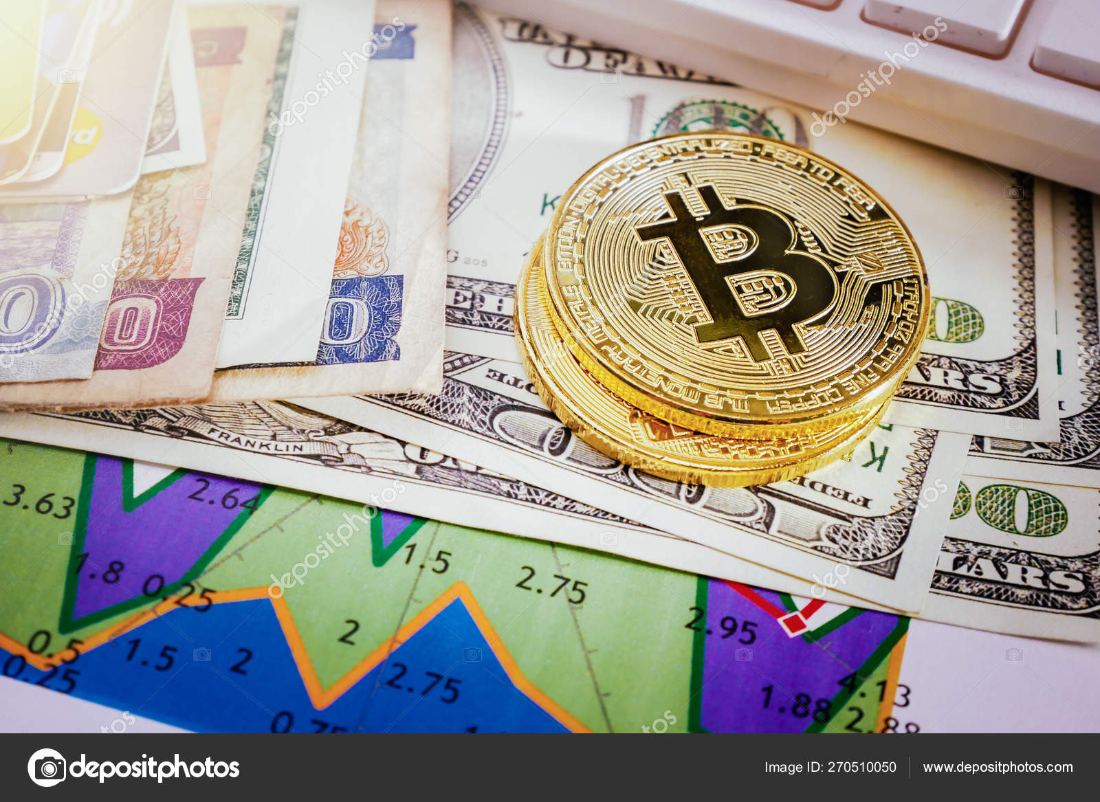 Golden Bitcoin Coin On Placed On Multiple Banknotes And Graphs On - 