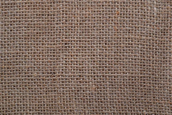 Sackcloth textuur achtergrond. Oude zak close-up kopieer ruimte voor tekst en ontwerp op zak getextureerde achtergrond — Stockfoto