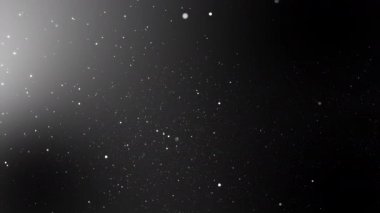 bindirme için siyah arka plan üzerinde uçan uzayda parlayan parlak parçacıklar yukarı hareket