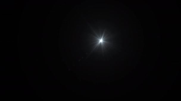 Φωτογραφική μηχανή φλας έκρηξη φως φωτοβολίδες φακοί φωτεινή λάμψη δέσμη σε μαύρο φόντο για επικάλυψη μετάβαση σε πλάνα — Αρχείο Βίντεο