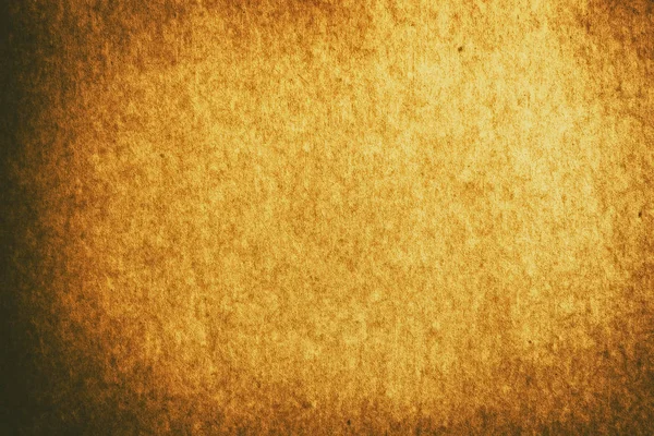 Full frame old gold brown paper texture background with vignette for design backdrop or overlay design — Stock Photo, Image