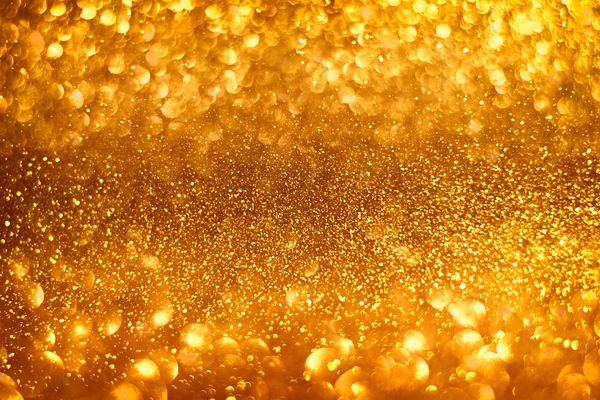 Abstract gold sparkles shiny defocused gold bokeh lights background use us gold luxury background for card, flyer, invitation, placard, voucher or banner background — Stock Photo, Image