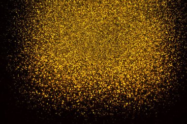 Soyut altın glister siyah arka plan vinyet üzerinde deffocused bize kart, el ilanı, davetiye, plaket, kupon veya afiş arka plan için altın lüks arka plan kullanın