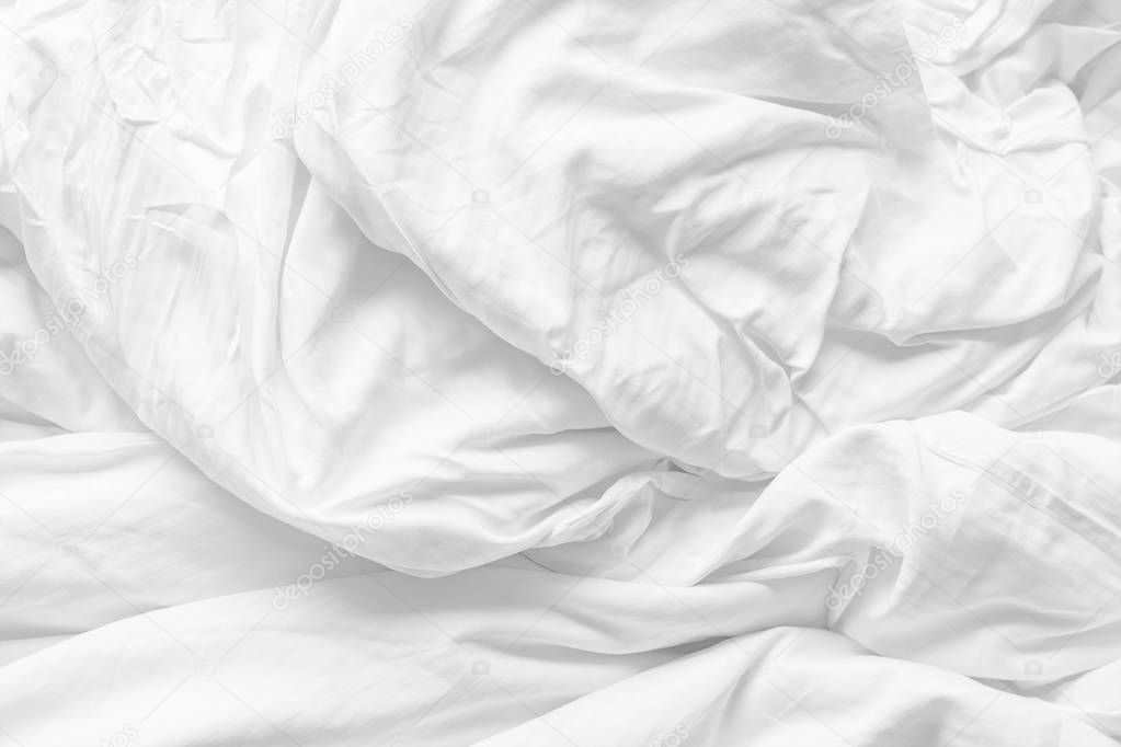 Soft white fabic texture wrinkled texture ,Soft focus white fabic crumpled from bedding blanket use us background