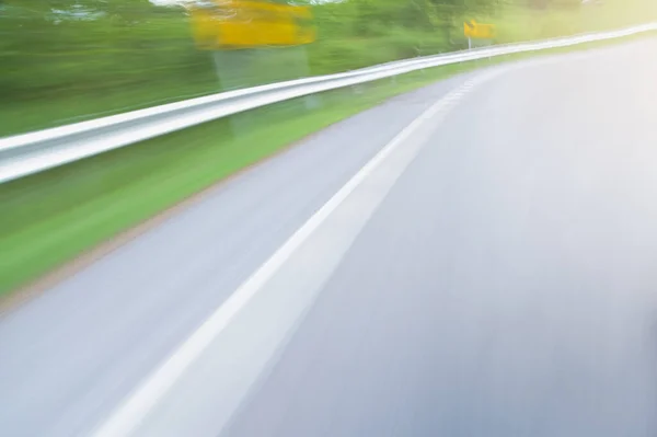 Blurred Asphalt Curve Road Motion Blur Driving Fast Background — Stock Photo, Image