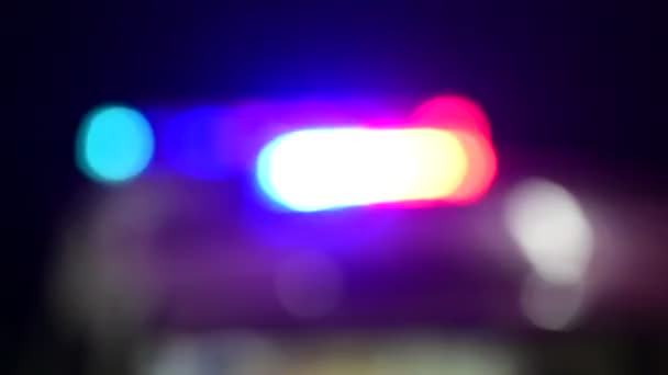 Blurred Hospital car emergency lights flash at night. Car accident. Crime scene. Flashing, alarm — Stock Video