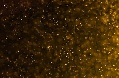 Altın parıltı dokusu soyut ışık arkaplanı