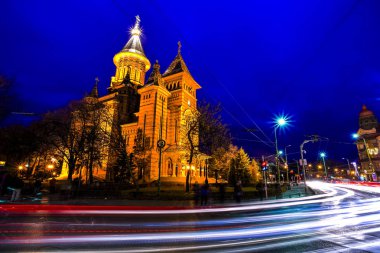 The Romanian Orthodox Metropolitan Cathedral of Timisoara seen at the blue hour from the streets. Timis County, Romania. clipart