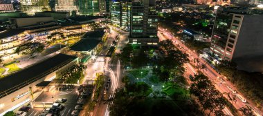 Cebu City, Philippines - Jan 2018: Long exposure shot of Cebu Business district and Ayala Terraces. clipart