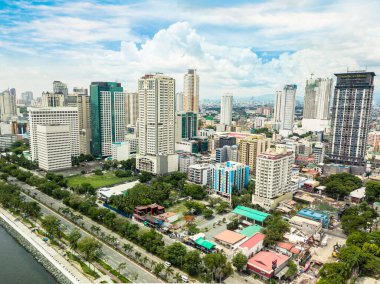Manila, Philippines - June 2020: Malate Skyline and Roxas Boulevard. clipart